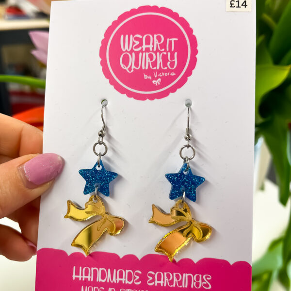 Blue Star and Gold Bow Dangle Earrings