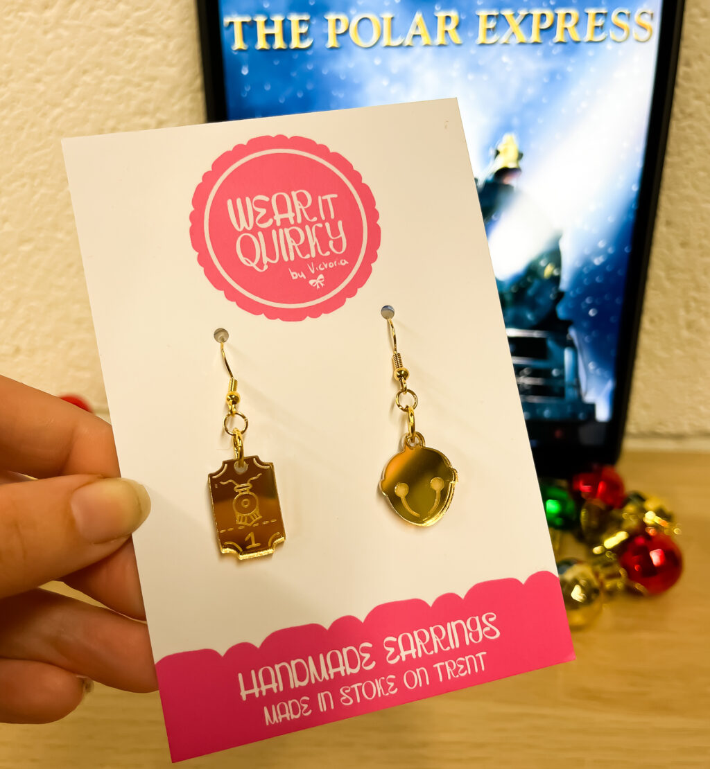 Gold Bell and Train Ticket Charm Earrings